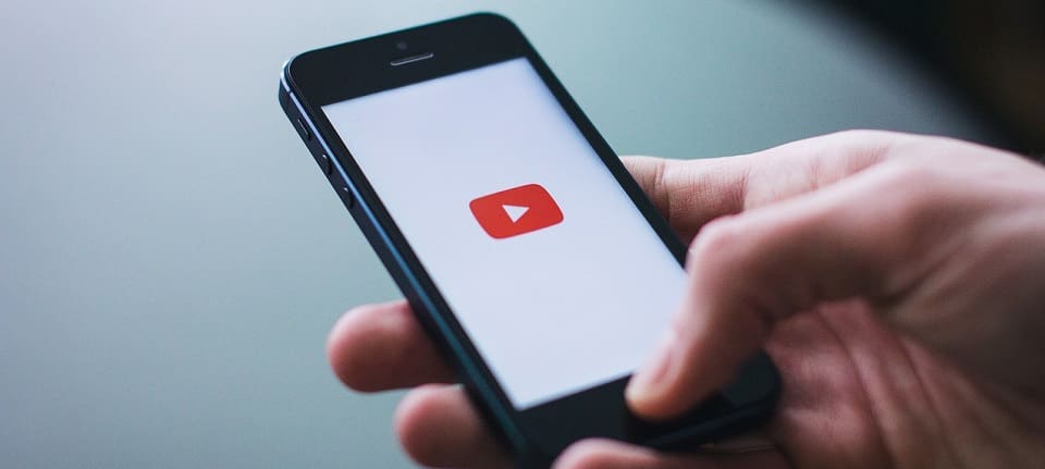 Image of YouTube on a Mobile Phone Video SEO Post